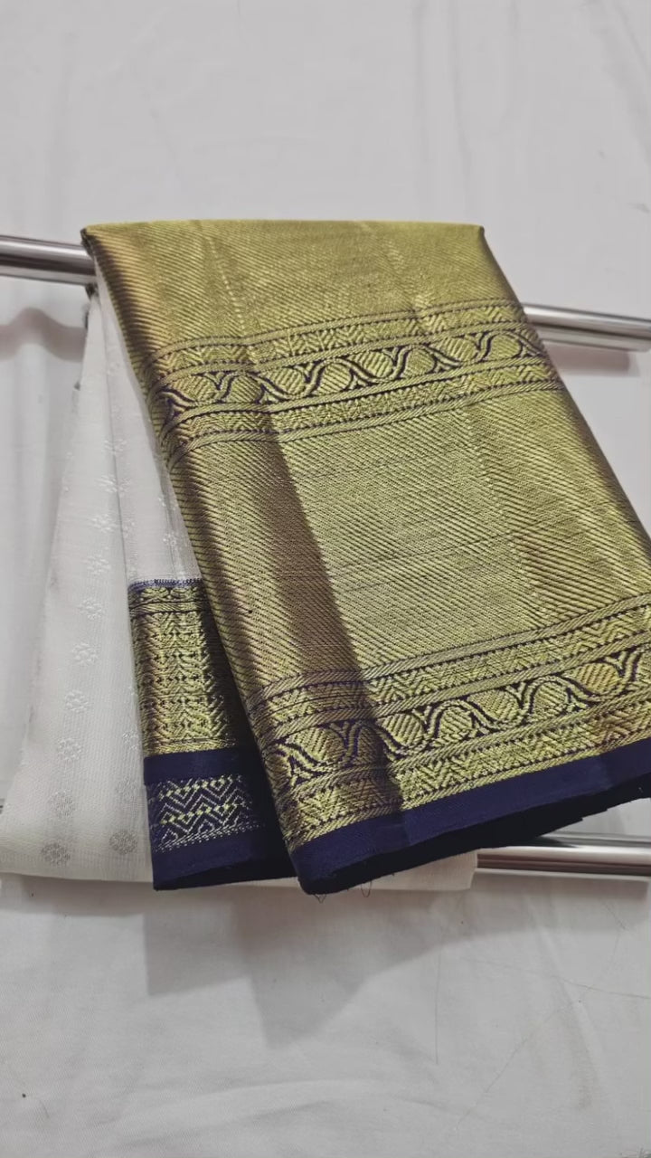 25% discounted price, 100% Pure Kanchipuram 1gram gold Zari used. White and blue combination blouse,  pallu and border. Zari Woven Kanchipuram Silk Saree with Unstitched Blouse.